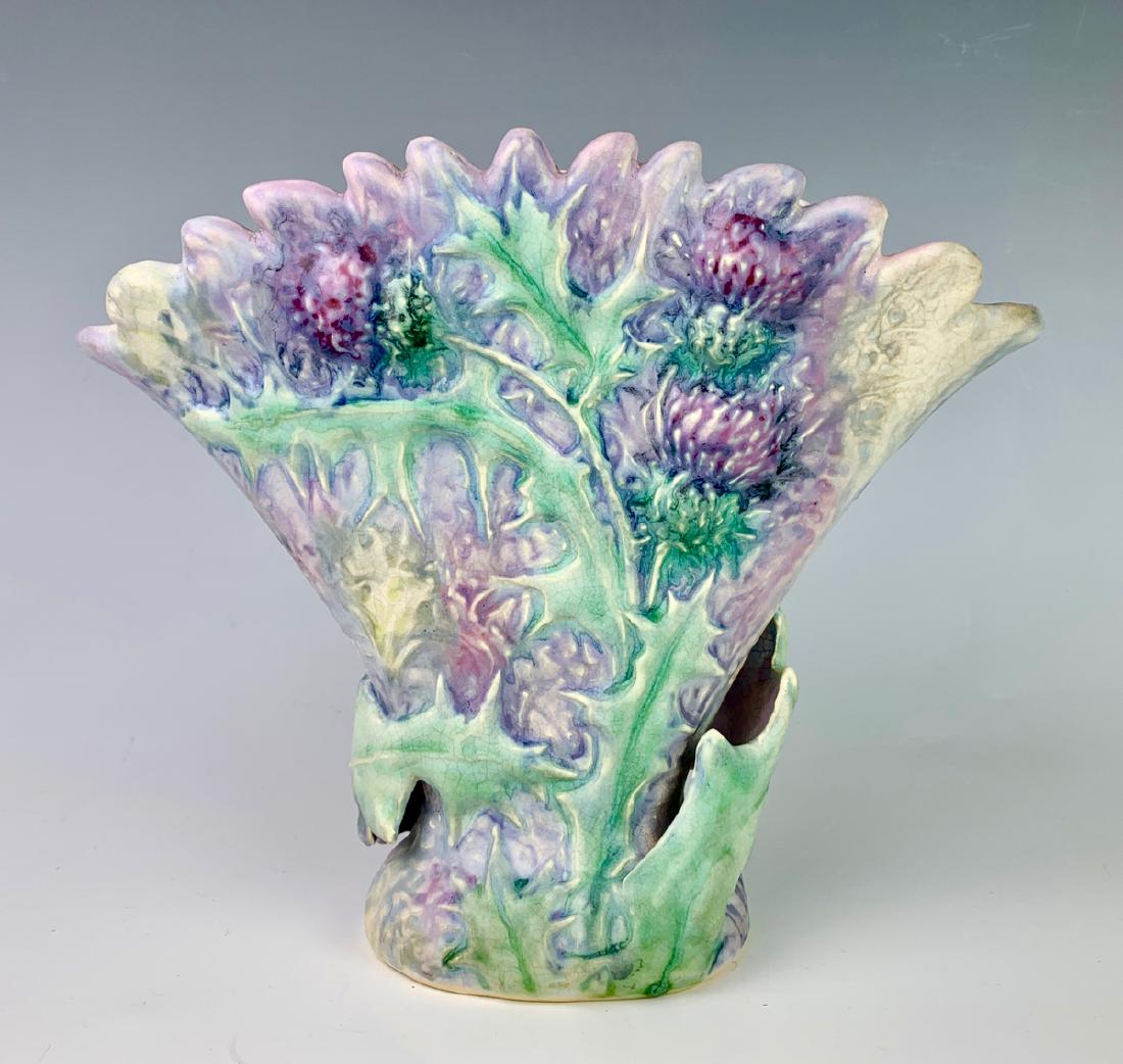 Weller Silvertone Fan Vase w/ Thistle Slip Design: Excellent and scarce example and design in the Weller Silvertone line, rich pastel colors, great mold, leafy handles cloaking the lower edge of the vase, marked "Weller Pottery" on bottom with "17" an