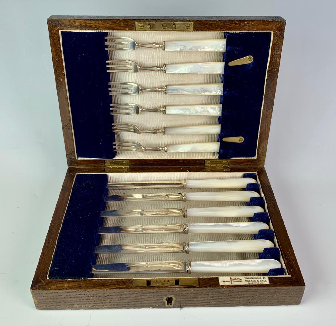 Walker & Hall M.O.P. & Sterling Fruit Set w/ Box: Consisting of 6 knives and 6 forks, mother of pearl handles and sterling silver, all in their original fitted wood box, has Walker & Hall Sheffield trademark, each piece is hallmarked with lion passan