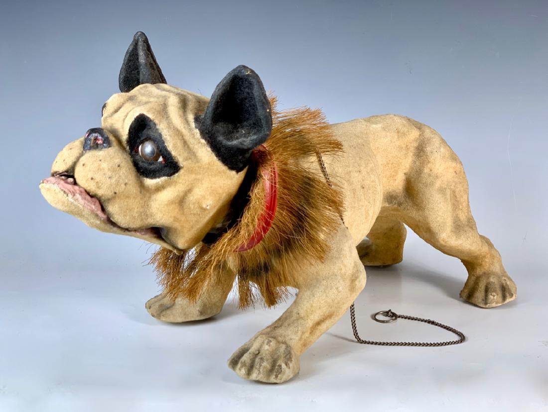 Growler Dog Pull Toy C. 1890: Composition French bulldog with glass eyes and original straw collar, original growler is working fine and operated by a pull chain, very good condition, 22" x 13" *Visit https://youtu.be/GAV5bGFvt-I 