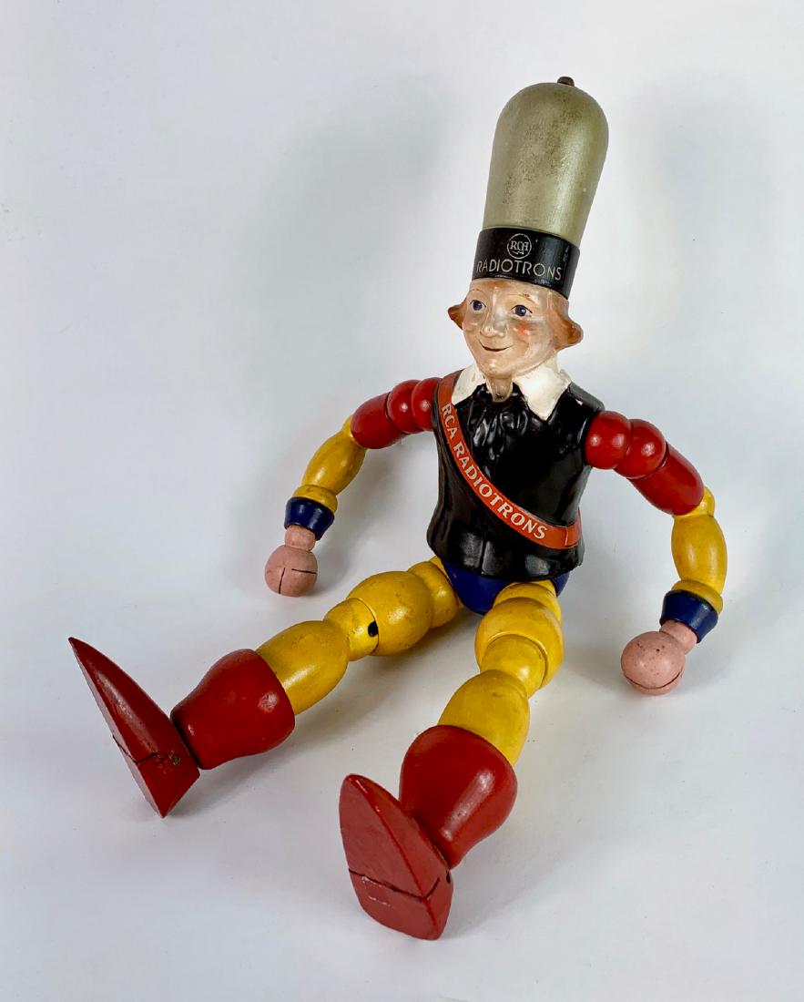 RCA Radiotrons Painted Wood Jointed Ad Doll: Wooden arms, legs, painted composition body and head, designed by artist Maxfield Parrish and manufactured by Cameo Doll Co. for store displays and advertising, minor flaking of paint on back of head,