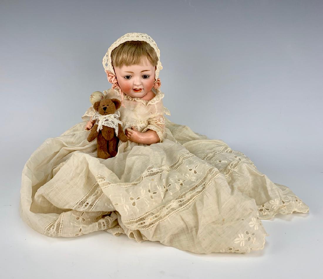 Kestner "Sammy" Character Baby C. 1910: Brown sleep eyes, marked "Made in Germany 211 JDK", open/close mouth with molded tongue, five piece Kestner body with some wear to hands, original blond mohair wig with plaster pate, original christen