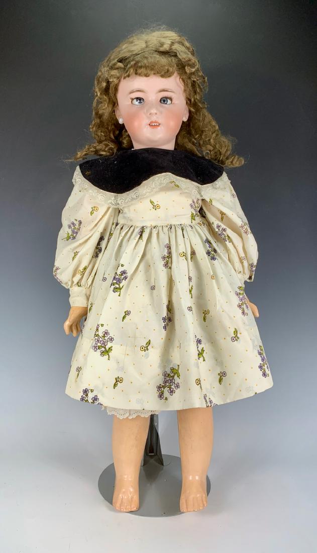 French Late Bebe Jumeau Doll C. 1895: Blue glass sleep eyes (loose and need resetting), open mouth with teeth, stamped "Bebe Jumeau" on back of head, fully-jointed Jumeau composition body with jointed wrists, body has oval "Bebe Jumeau" s