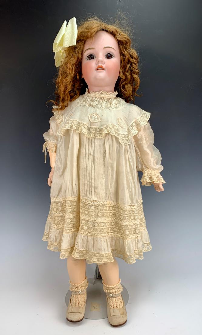 Kley & Hahn "Walkure" C. 1885: German, brown set glass eyes, fully-jointed composition body, some paint cracking off hands, some wear on body, original auburn antique wig, vintage dress, undergarments antique, very good condition,