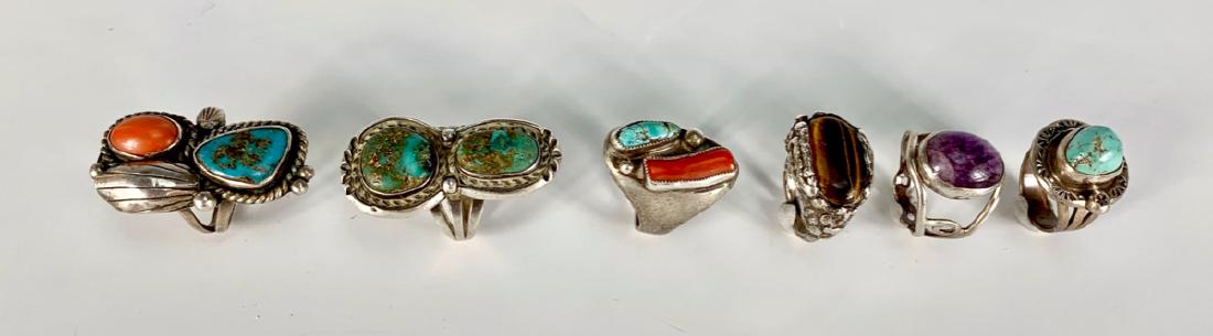 6 Turquoise, Other Stones & Silver Rings: Consisting of 6 Native American rings, 2 turquoise, 2 turquoise and coral, 1 tiger eye and 1 amethyst, all on silver, sizes 5 - 9, good condition, 15mm largest stone
