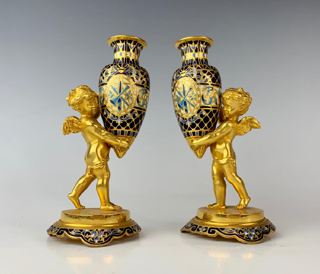 Pair of Gilt Bronze & Champleve Cherub Vases: Late 19th century, depicting gilt bronze cherubs holding up bronze and champleve urn vases, very good condition, 6.375" height