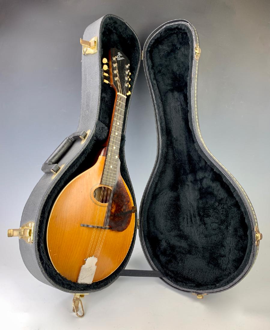 Gibson Mandolin #9506 Over 100 Years Old: Has label "Gibson Mandolin - Guitar MFG. Co Kalamazoo, Michigan USA", comes with case, good condition, 26"