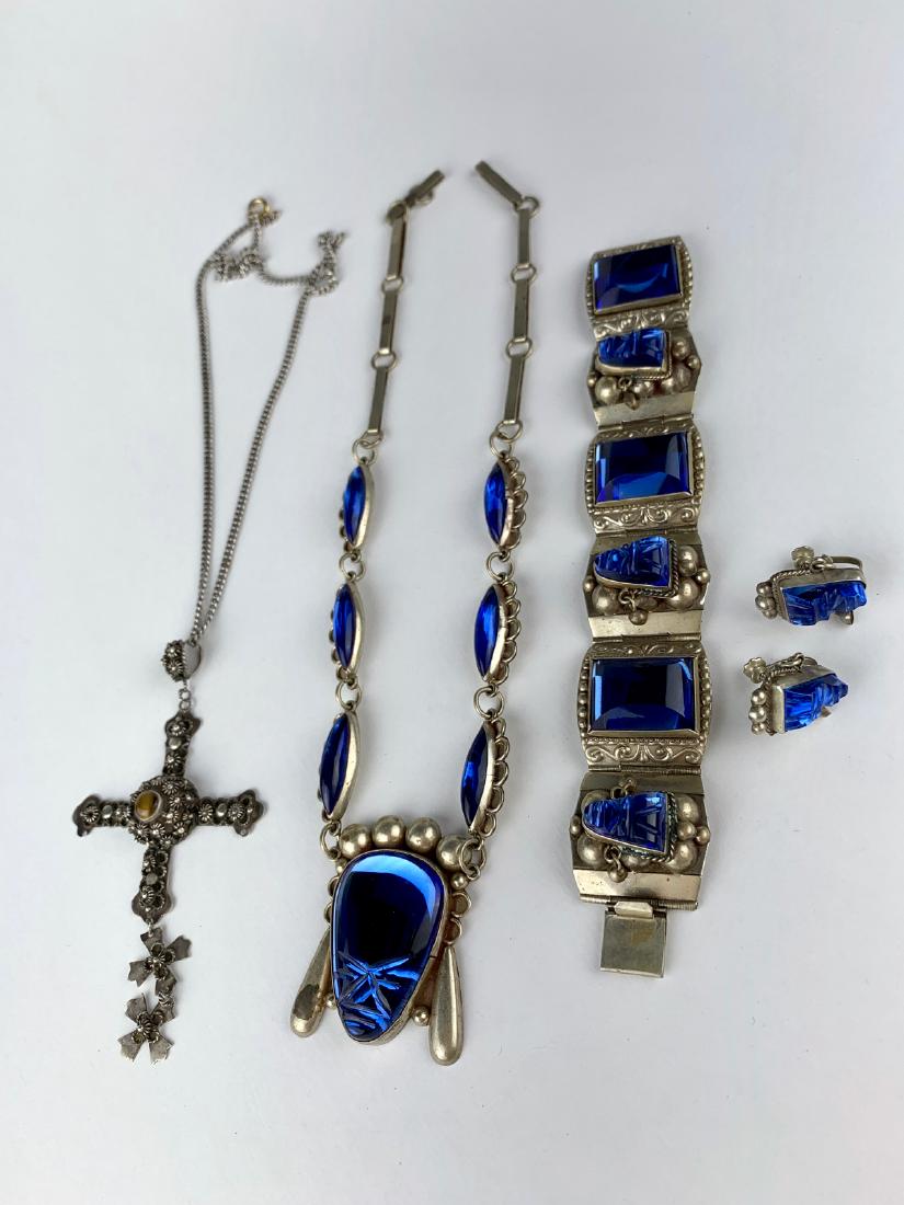 Group of Mexican Silver Jewelry: Consisting of a blue stone necklace, bracelet, pair of earrings and cross on chain, all marked, good condition