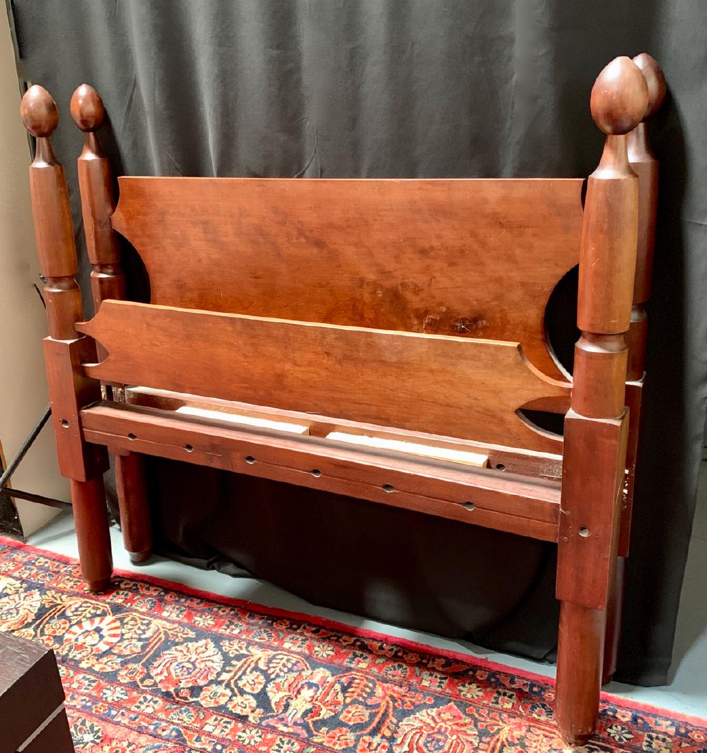 Antique French Empire Four Poster Rope Bed: Circa early 1800's, made of solid mahaogany, 4 poster bed, having pineapple finials, very good condition, 56" x 54"
