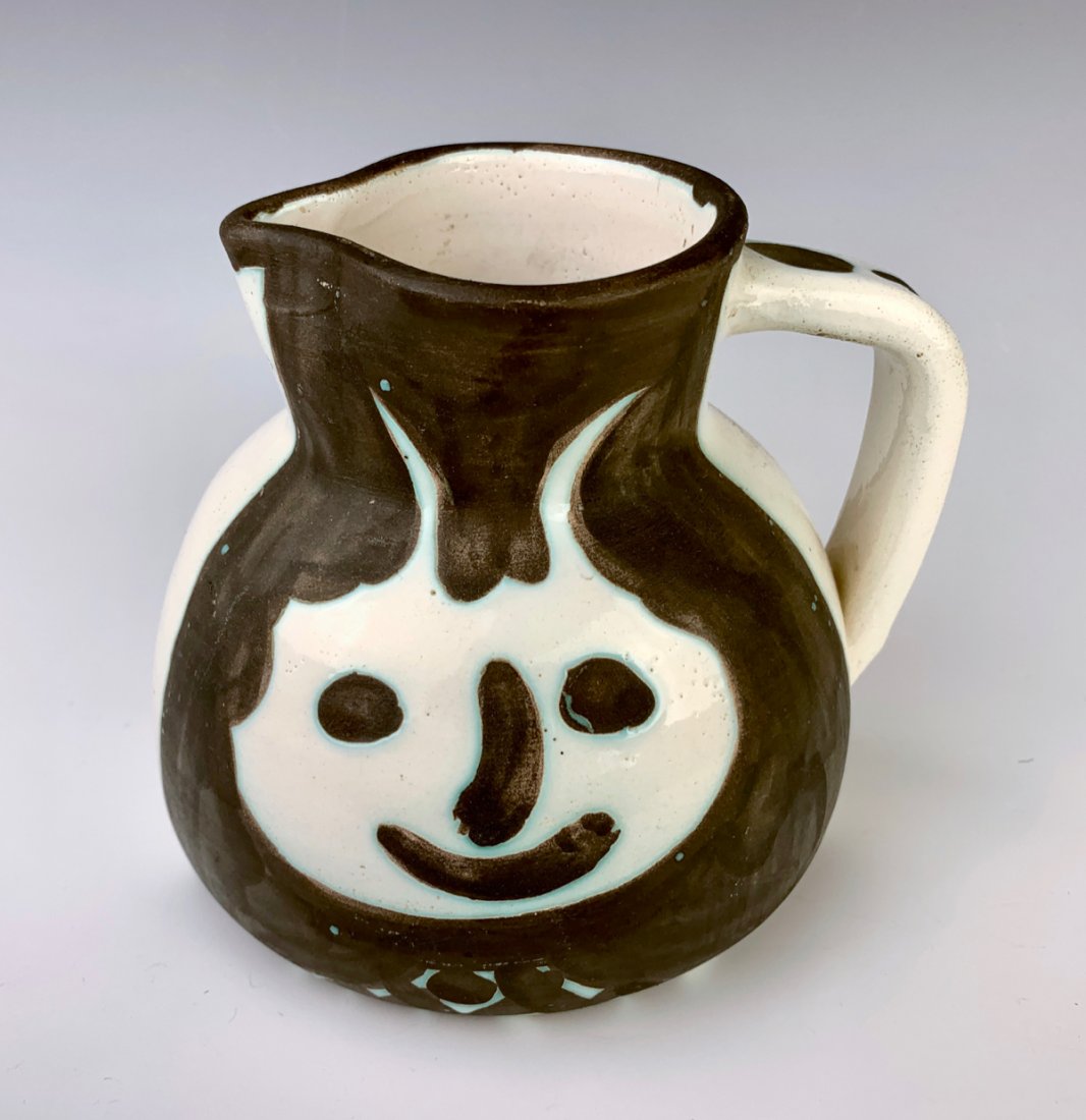 Pablo Picasso 1956 Madoura Tetes Ceramic Pitcher: Pablo Picasso (Spanish, 1881-1973) Tetes ceramic pitcher with stylized faces either side, from an edition of 500, signed "Edition Picasso" on base with impressed marks, very good condition, no chips, 