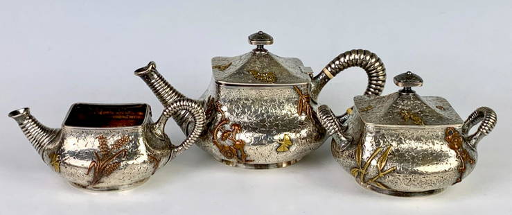 Rare Sterling Mixed Metal 3pc Tea Set: Attributed to Dominick & Haff sterling silver and mixed metal 3 piece tea set, all having hammered texture and leaves with copper appliques, marked "Sterling" and "148" with monogram "E.H." on bottoms