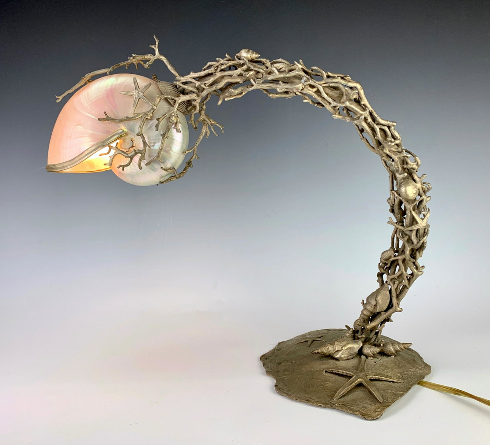 Aquatic Coral Form Silverplate Lamp: Unusual lamp encrusted with crustaceans such as shells and starfish and nautilus shade, very good condition, 15.5" x 17.5"