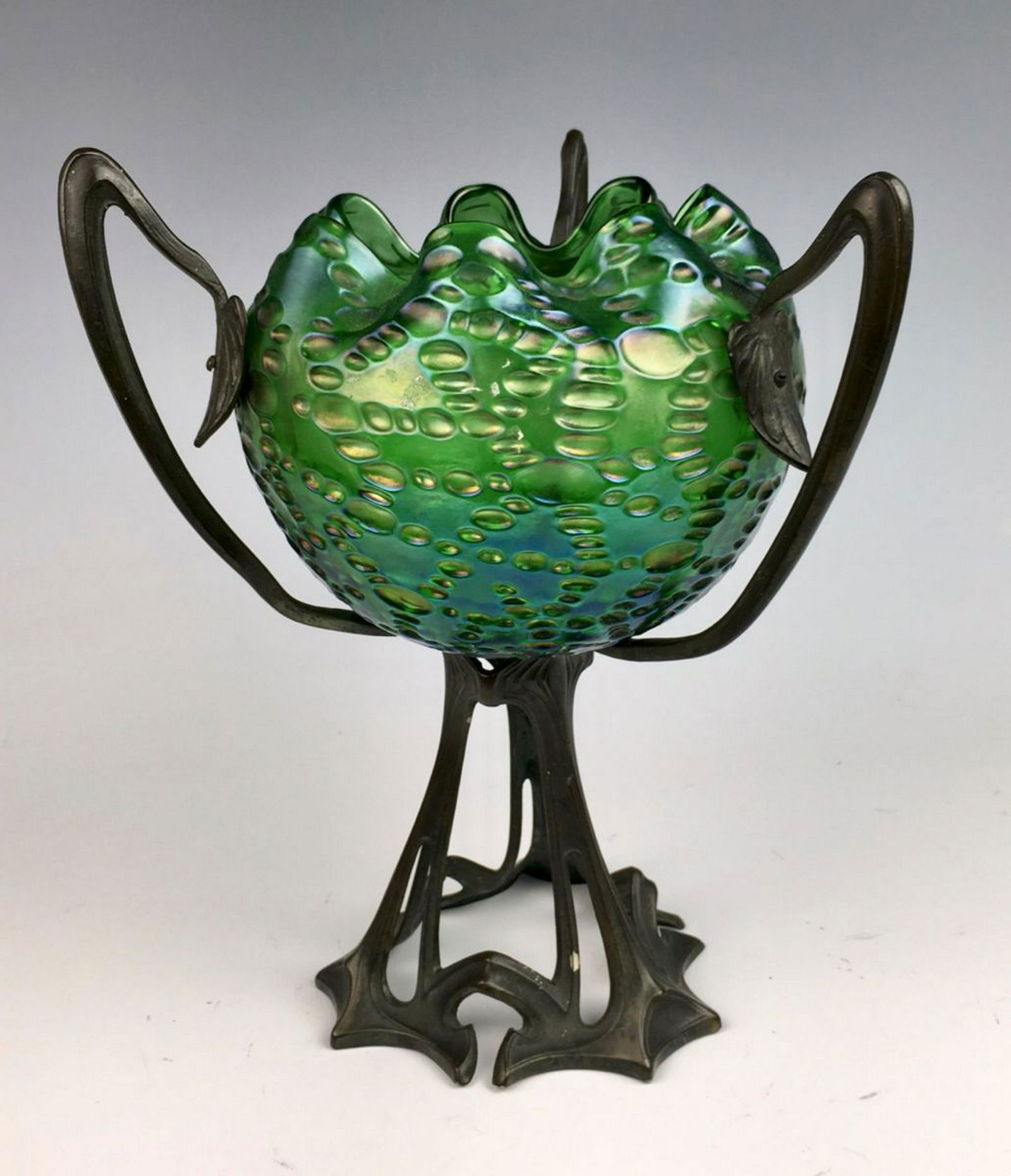 Loetz Type Art Nouveau Bronze & Glass Centerpiece: Circa 1890, Loetz style green glass bowl seated in a bronze grape and leaf frame, very good condition, 12" x 11"