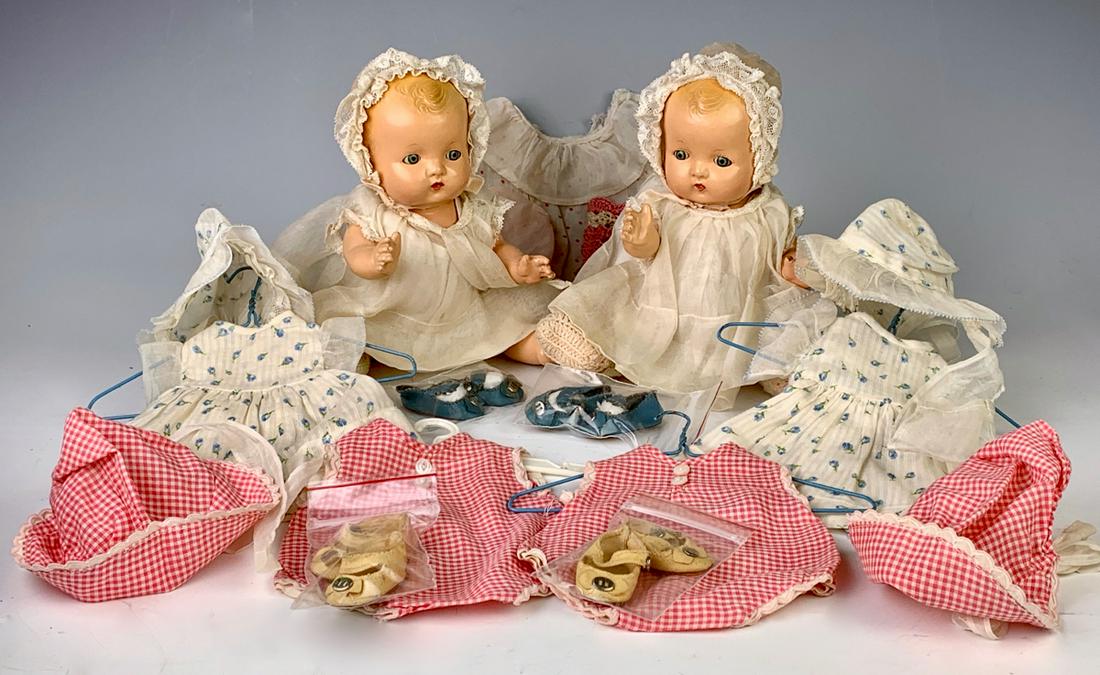 8" Pair Composition Baby "Patsy" Dolls by Effanbee: C. 1925, blue tin eyes, blond molded hair, layette consisting of three matching outfits per doll plus one extra outfit, two pairs of shoes, three booties (one missing), all original, generally excelle