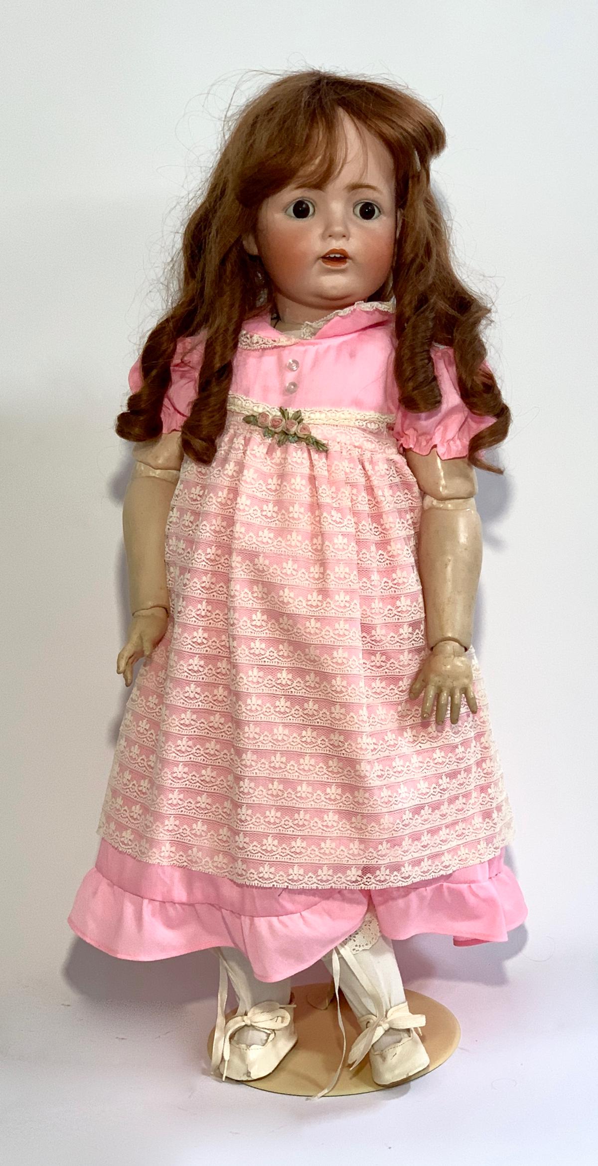 29" German Child Doll by Kestner: 1910, brown sleep eyes, newer French human hair auburn wig, open mouth with teeth, fully jointed child composition body, including wrists, marked "JDK 260", minor wear on body's original finish, cloth