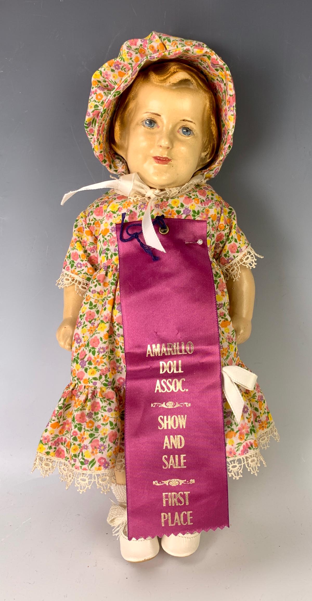 13" American Toddler by Jessie McCutcheon Raleigh: C. 1920, blue painted eyes, molded blond side-parted hair in bob style, open/close mouth with painted teeth, molded composition socket head with composition body jointed at shoulders and hips, clenche