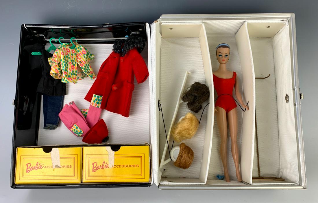 "Barbie" in Case by Mattel: In case, three piece wig wardrobe, six pieces of marked clothing plus swimsuit, case worn and missing handle, ears green, good condition