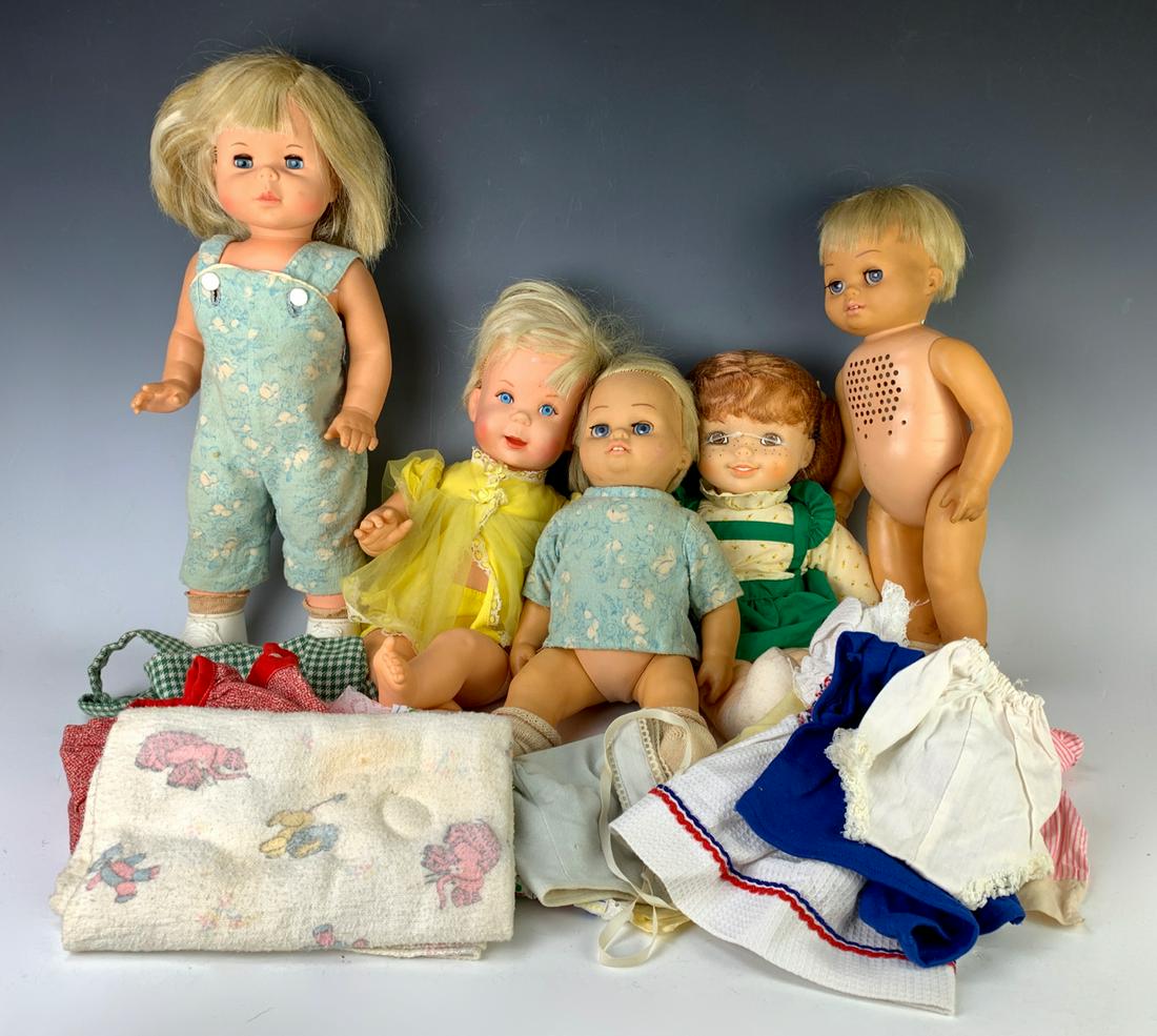 2 Chatty Babies by Mattel: C. 1960's, 1 Chatty Cathy, 2 miscellaneous vinyl dolls, 7 pieces of clothing, apron, cloth bag and flannel blanket, poor condition