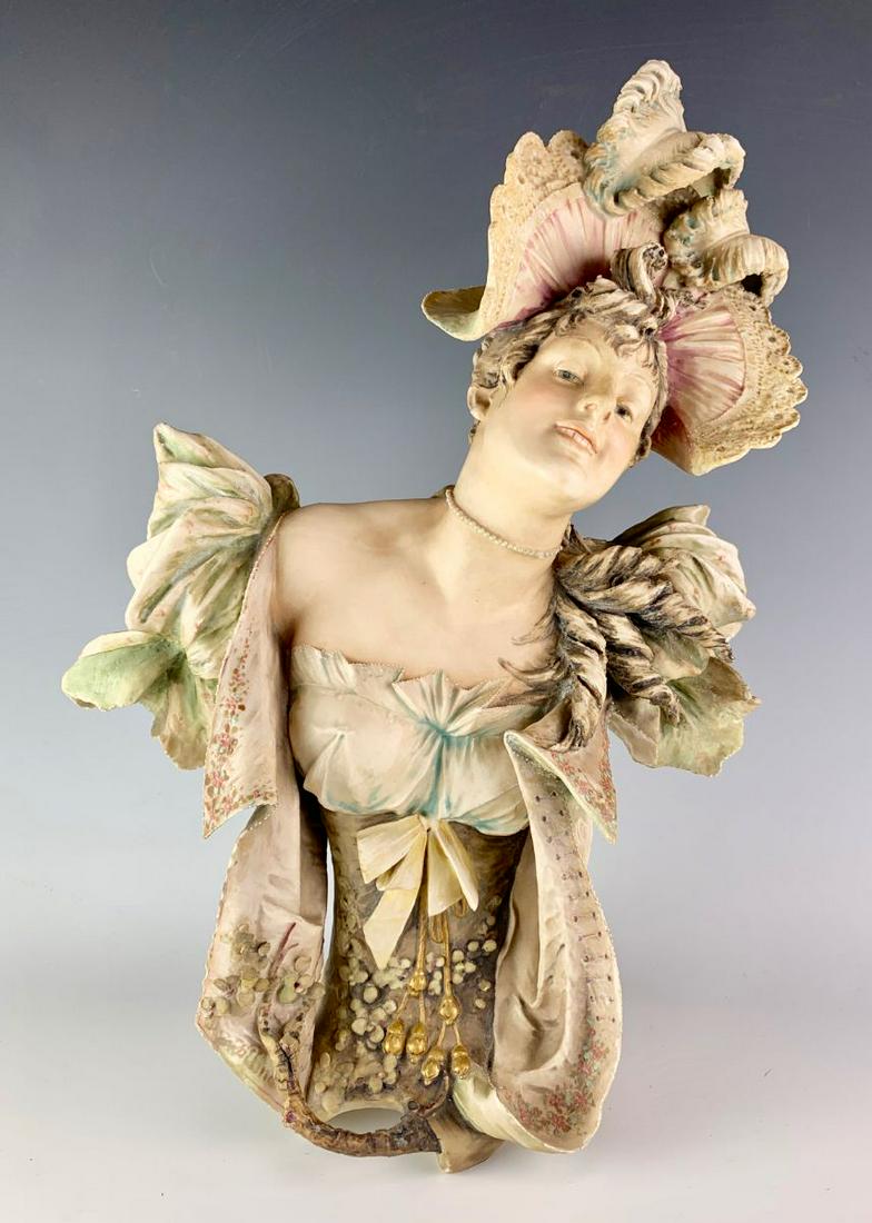 Amphora Lady Bust w/ Fancy Hat C. 1890: Beautifully colored porcelain bust of a maiden, signed and numbered "4001/47", good condition, 15" height