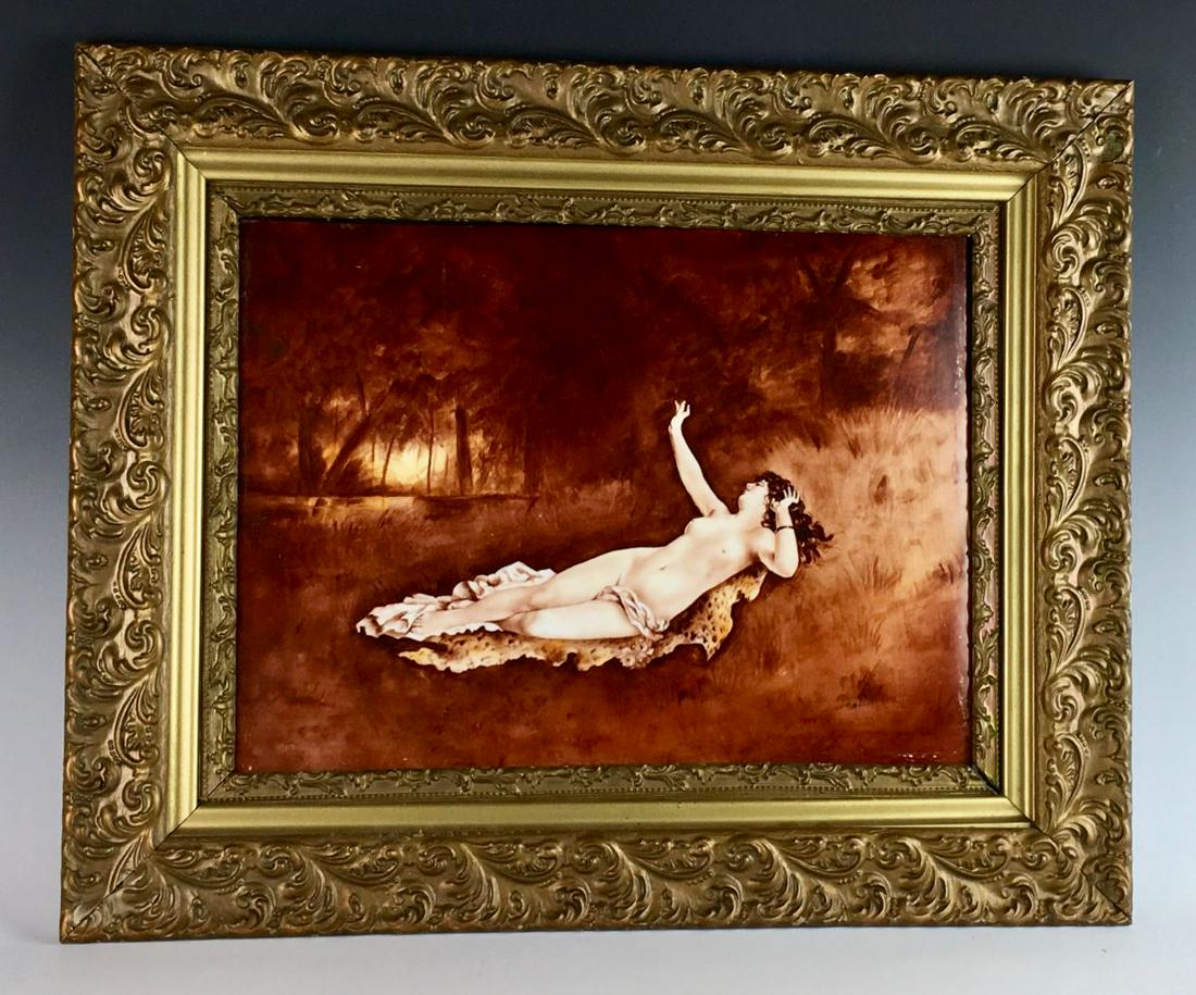 Large Reclining Nude Limoges H.P. Plaque: Circa 1900, hand painted nude reclining on a blanket in the forest, mounted in antique gilt ornate frame, artist signed "C.M. Elliott", good condition, 12" x 14.5" plaque, 18" x 23" with frame