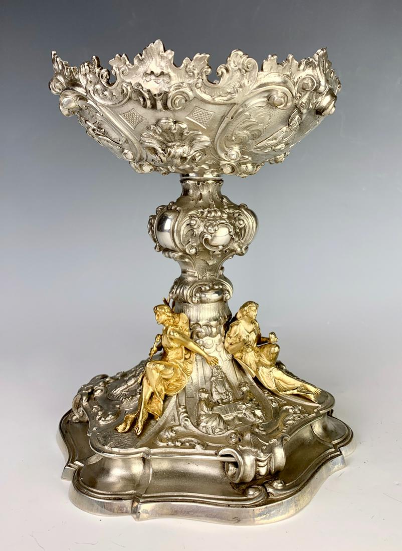 Italian 800 Silver Ciborium by Tanfani & Bertarelli: Circa 1900, having a chalice shape in ornate design in 800 silver, seated with 3 gold colored saints, marked with known religious maker metal smith Tanfani & Bertarelli Roma, marked with hallmarks, ve