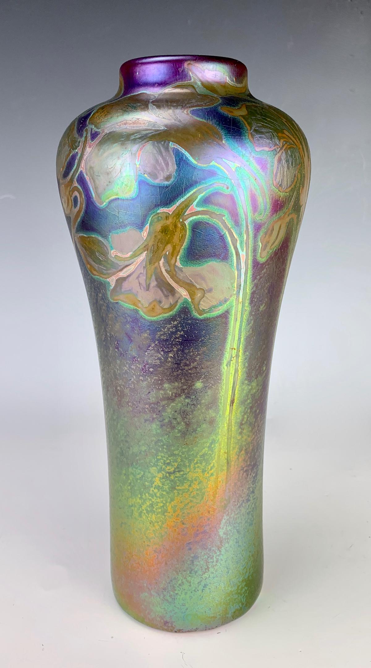 Tall Weller Sicard Art Nouveau Vase: Outstanding example of an art nouveau shaped Jacques Sicard iridescent floral vase, radiant colors of reds, blues and green, signed "Weller Sicard 501", very good condition, 11" height