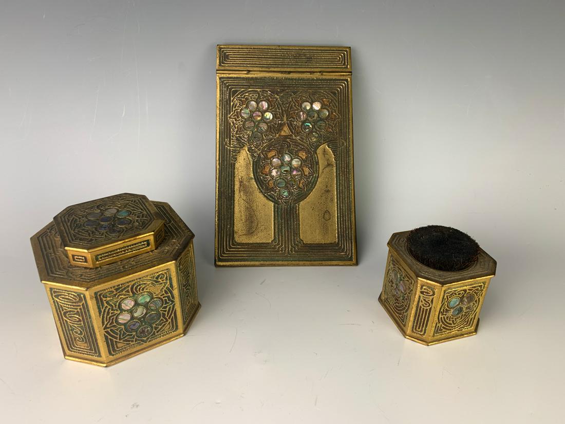 Tiffany Studios Abalone Inkwell, Notepad, Pen Wipe: Consisting of an inkwell, notepad holder and pen wipe, all three signedf "Tiffany Studios, New York", "1151", "1169" and "1160", good condition, rub wear commensurate with age, 7.5" x 4.75" largest
