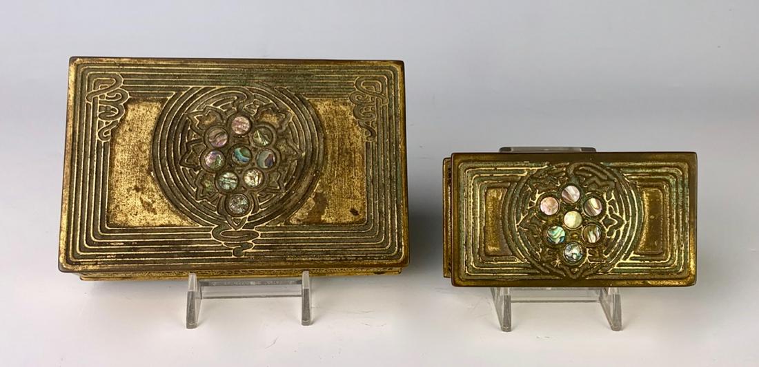2 Tiffany Studios Abalone boxes: Both signed "Tiffany Studios, New York", "1176" and "1158", one a utility box and the other a stamp box, good condition, rub wear commensurate with age, 5.375" x 3.5" largest