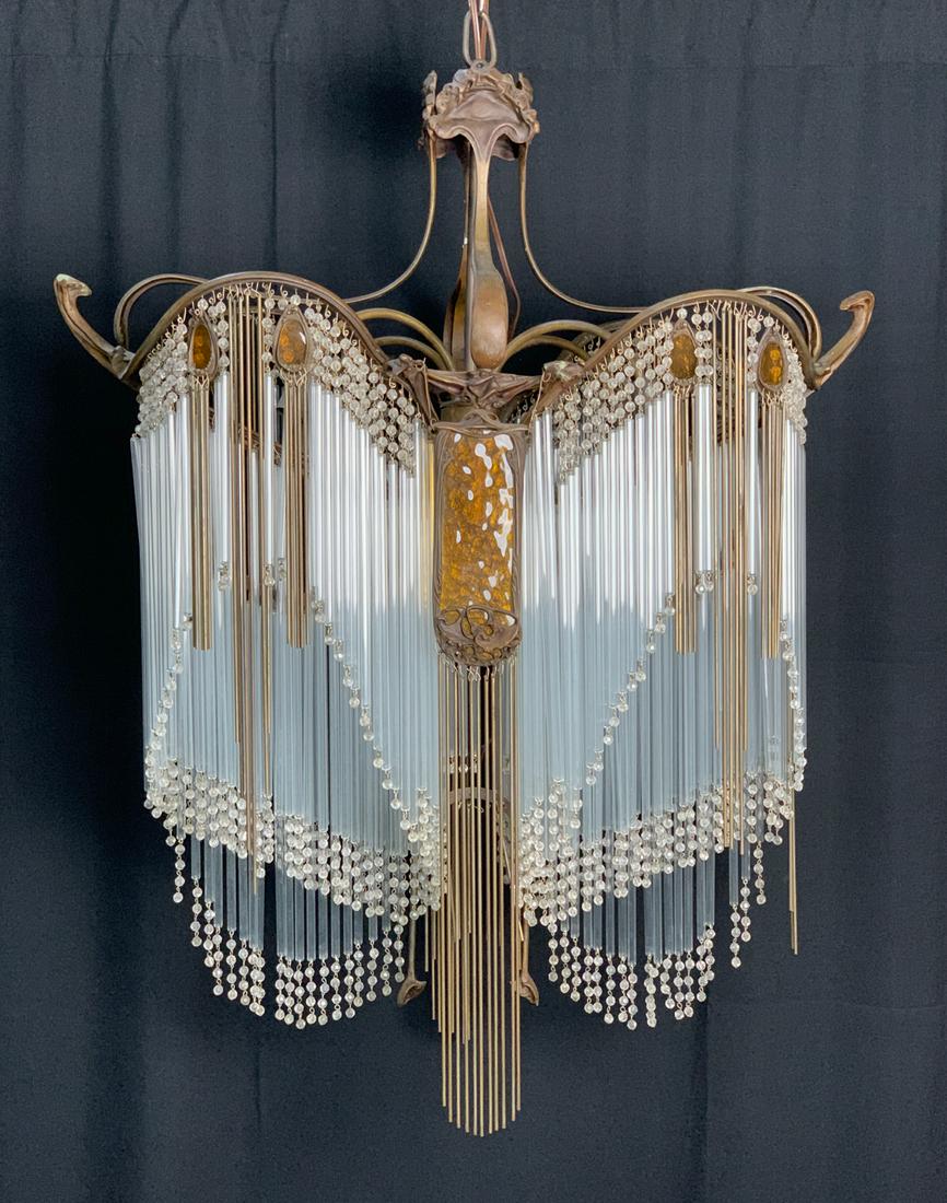 Art Nouveau Chandelier after Hector Guimard: A fabulous art nouveau chandelier after Hector Guimard, gilt bronze with glass rods, steel rods and amber glass panels, signed with Guimard mark, direct from an upscale Studio City home, overall good