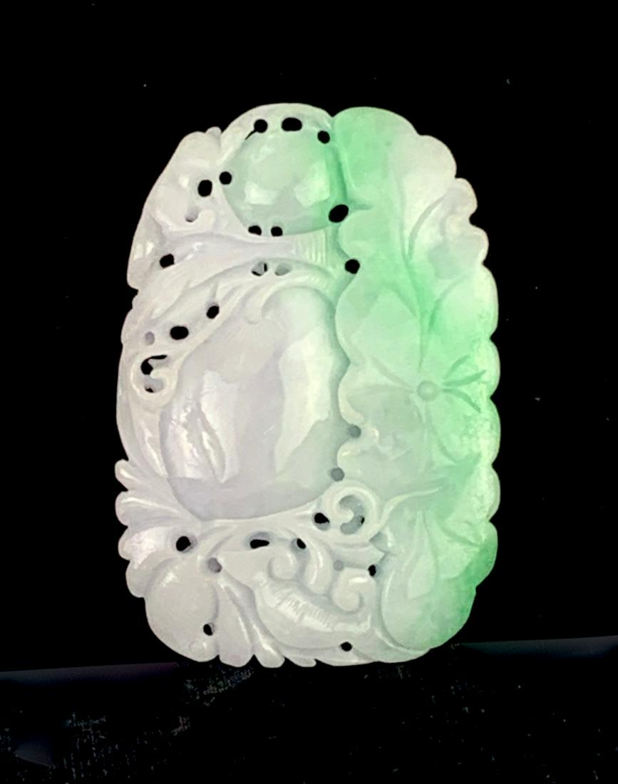 Large Chinese Jade Pendant with Monkey: Beautiful carved jade pendant with incised floral and monkey decoration, all jade items guaranteed to be genuine jade, very good condition, 3.75" x 2.5"