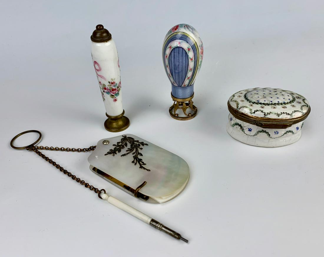 2 Letter Seals 1 Battersea Style Box & Writer Pad: Group lot of 4 items, 2 letter seals one being enamel and the other porcelain, one oval enamel Battersea style box with mirror and a mother of pearl with bronze decorated writer's pad with 5 pull outs