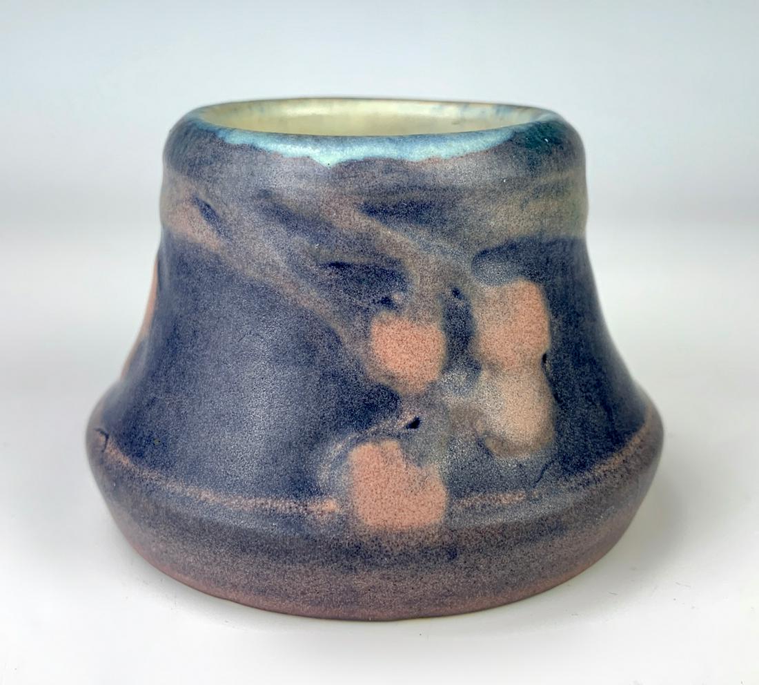 Newcomb College "Cherry Tree" Pottery Vase: Blue tint with pink cherries hanging off vines, fully marked on bottom with Newcomb College logo "SV89", "12" and "JM" for Joseph Fortune Meyer (1848-1931), very good condition, 2" height