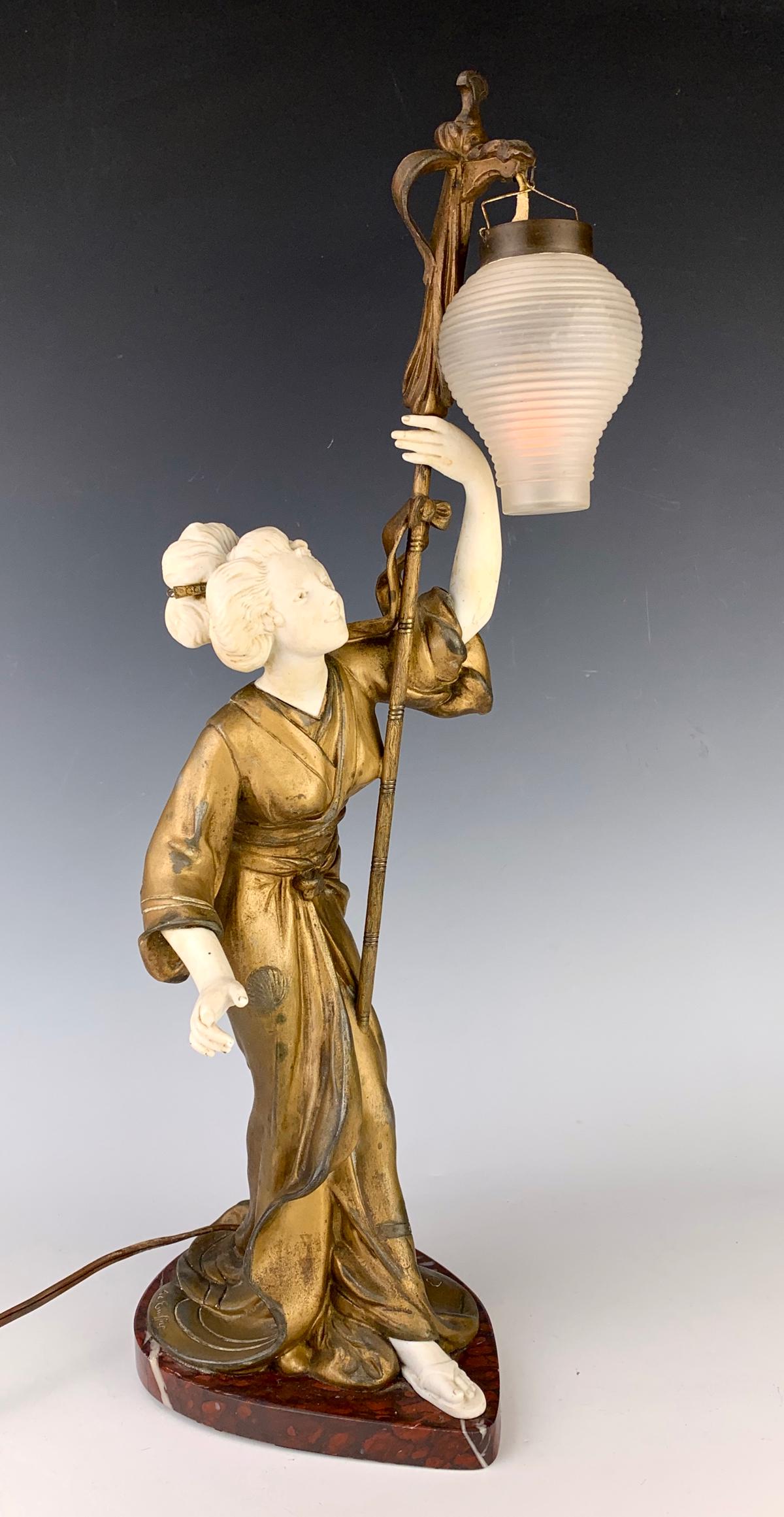 Adolph A. Truffier "Geisha with Lantern" Lamp: Circa 1910, wonderful art nouveau period "Geisha with Lantern" lamp, made of base metal, bisque porcelain and glass shade, signed in metal "A. Truffier", mounted on a rouge marble base, good condition
