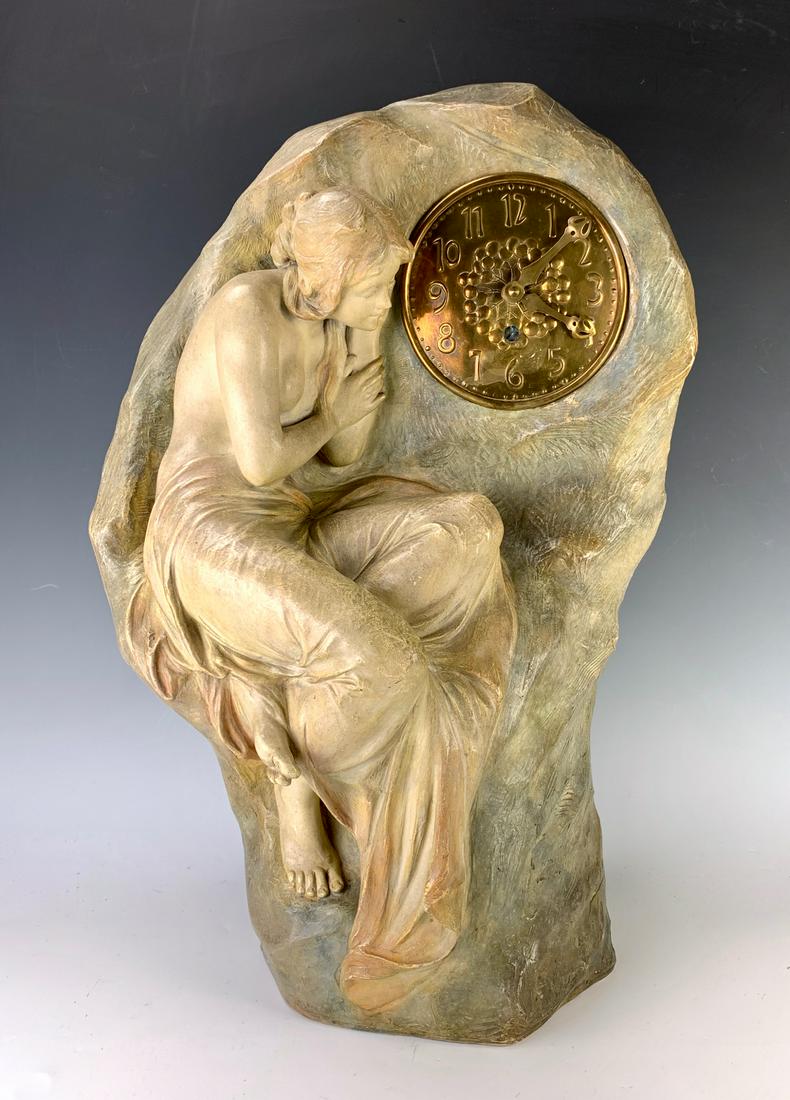 Goldscheider Art Nouveau Semi Nude Clock: Depicting a semi nude lady sitting and looking at the clock, fully marked with Goldscheider logo "2517, 1, 55", clock has battery movement, very good condition, 21.5" height *Clocks and watches are no