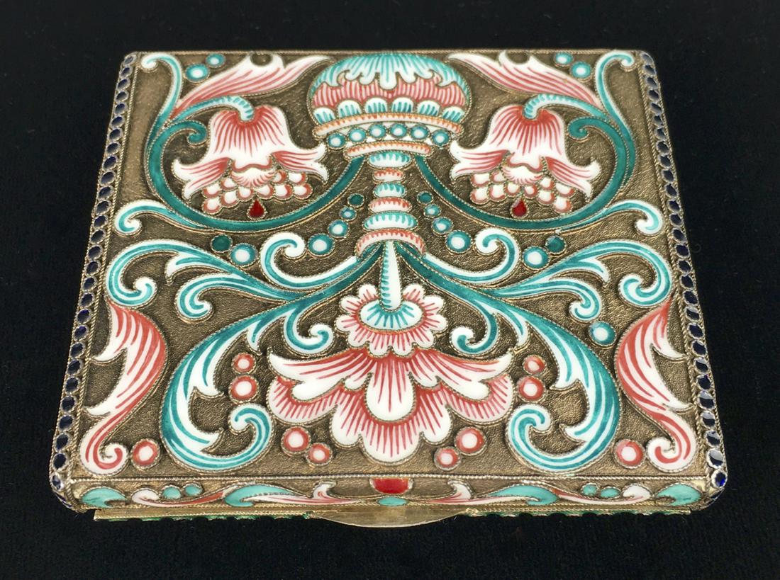 Russian Silver & Enamel Cigarette Case: First quarter of 20th century, attractive Russian sterling silver and enamel cigarette case with floral "antique Russian" design, interior gilded having hallmarks on inside lid that are indiscernible,