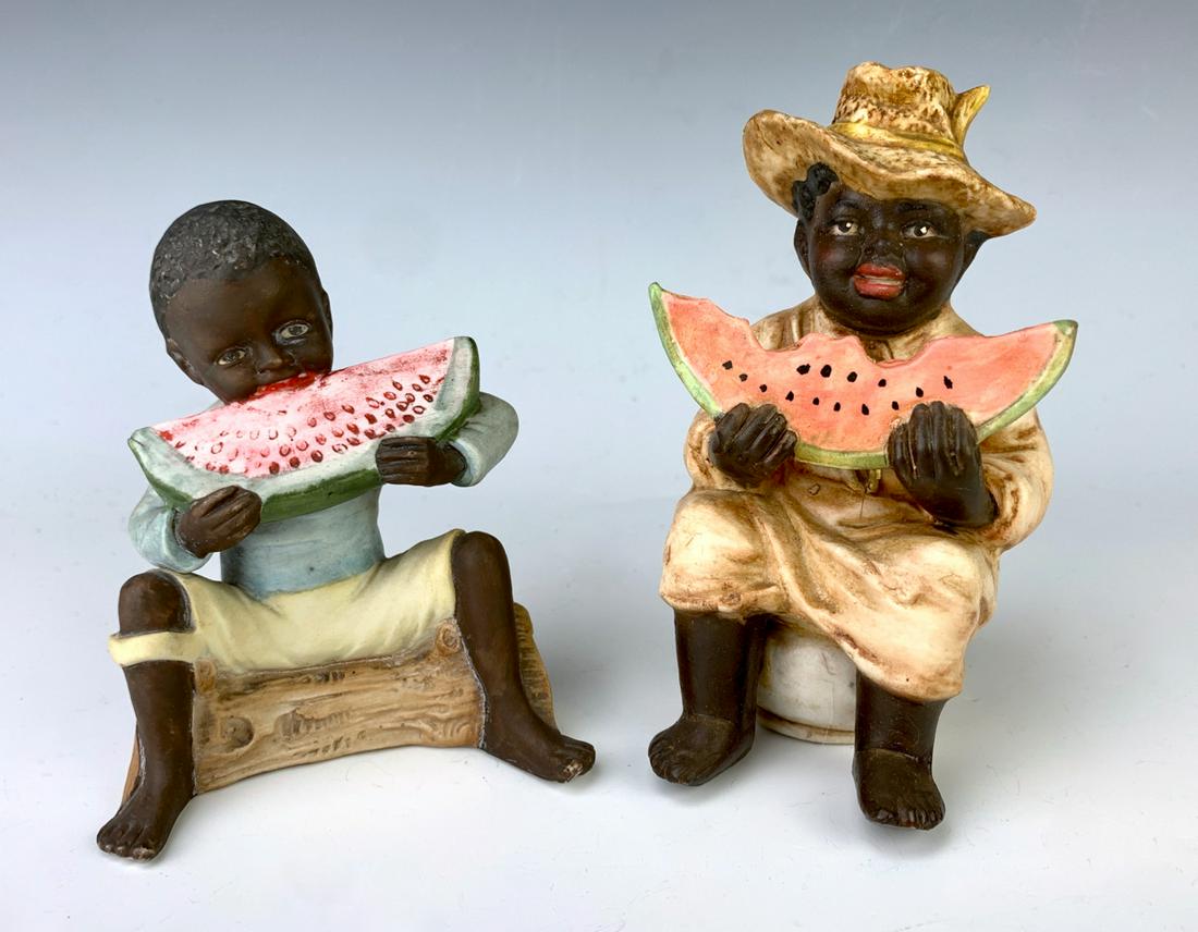 2 German Bisque Black Watermelon Eaters: Circa 1900, both bisque, one sitting on a potty and the other on a log, good condition, 5" tallest **Lifetime estate collection of Jeannine Hamilton, Oak Park, CA** *Domestic in-house shipping availab