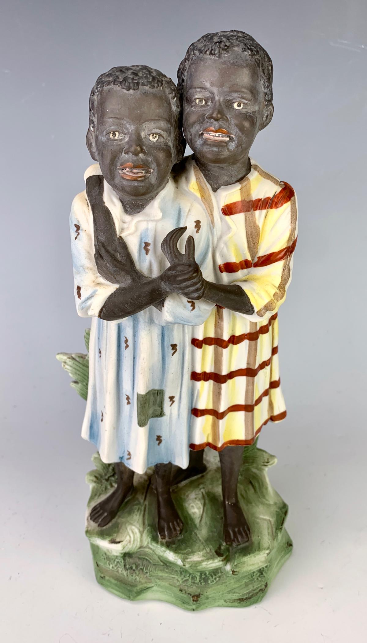 Black Americana Bisque "Best Friends" C. 1900: Fine quality bisque figurine depicting 2 children with one having her arm over her shoulder, very good condition, 9.5" height **Lifetime estate collection of Jeannine Hamilton, Oak Park, CA** *Domesti
