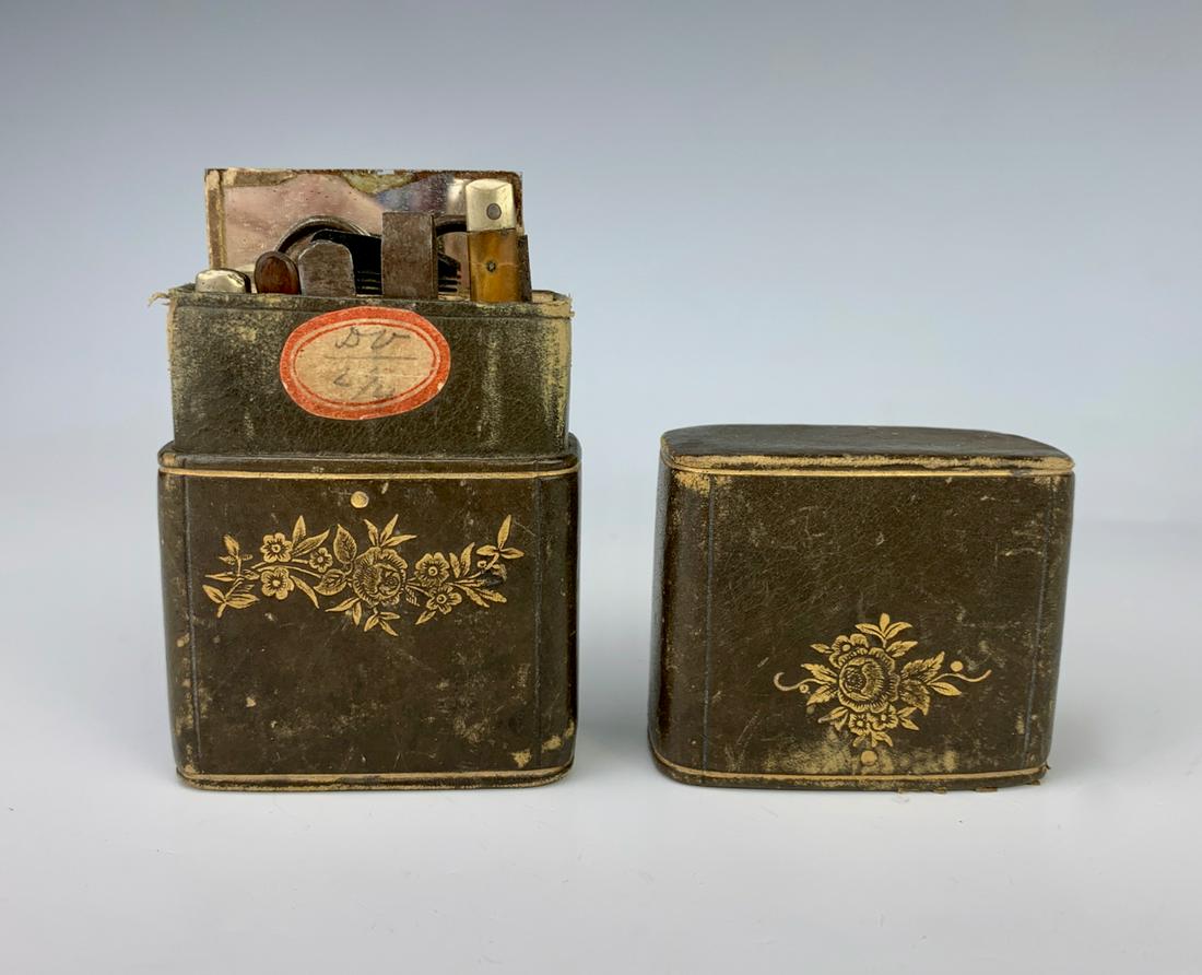 Antique Etui 9pc. Set in Leather Case C. 1900: Consisting of a mirror, scissors, comb, 2 pocket knives, comb, file, tweezers, toothpick, set in leather case, set is complete, good condition, minor rusting commensurate with age, 3" x 2" **Lifetime