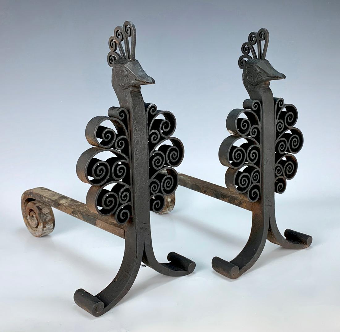 Rare Pair Signed Edgar Brandt Peacock Fire Dogs: Wrought iron fire dogs modeled as stylized peacocks, each signed "E. Brandt France", very good condition, 13.5" x 14" x 6.5"