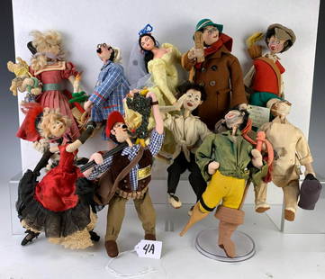 Group of 10 Attributed Klumpe Carricature Dolls: Made in Spain, having a pirate, doctor, hunter, dancer, golfer, flamenco dancer, traveler, boy, man walking his dog and gal holding her dog, very good condition, 10" tallest **Lifetime estate