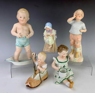 5 Antique Heubach Bisque Porcelain Piano Babies: Having a tall baby boy standing in a wash basin signed Heubach, tall boy adjusting his glasses, baby in shoe signed Heubach, baby in high chair signed Heubach, and baby holding a mug #2279, very good