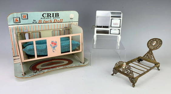 Group of Vintage Doll China and Furniture: Consisting of a googly eye doll tea set in original box, another tea set by Reutter Porzellan, Germany, in original box, American miniature stove and a metal doll crib with original advertising