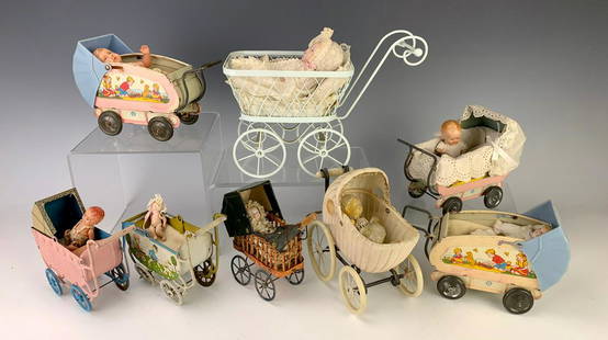 Collection of 8 Antique Baby Carriages w/ Babies: Great collection consisting of 8 antique baby carriages with each having baby doll inside, 6 made of tin, 1 wicker, and one celluloid, very good condition, 9.5" widest **Lifetime estate collection of