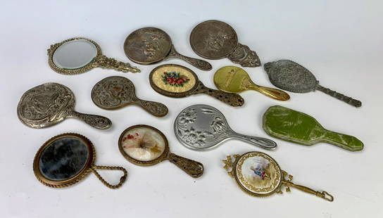 13 Antique Doll Hand Mirror: Variety of materials, mostly metal, good condition, 5" longest **Lifetime estate collection of Jeannine Hamilton, Oak Park, CA***In-house shipping within the U.S. available for this lot*