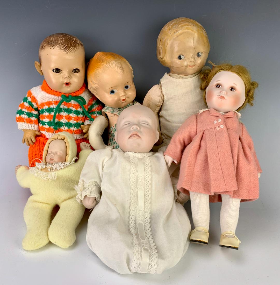 Group of 6 Dolls with a 10" Effanbee Dy-Dee Baby: Consisting of a 10" Effanbee "Dy-Dee" baby doll, 2 composition and 3 porcelain type dolls, good condition, 10" longest **Lifetime estate collection of Jeannine Hamilton, Oak Park, CA**