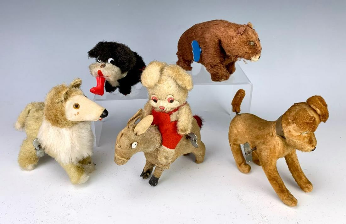 Vintage Group of 5 Small Wind Up Animal Toys: Consisting of 3 dogs, a bear and a rabbit riding a donkey, good condition, working but no guarantee on mechanics, 6" tallest **Lifetime estate collection of Jeannine Hamilton, Oak Park, CA** *Contact 