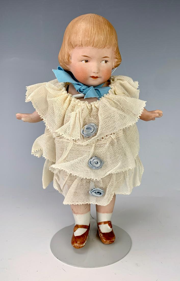 G. Heubach All Bisque "Girl with Bobbed Hair": Brown painted side glancing eyes, molded bob hairdo, 1 piece head and body, jointed at shoulders and hips, front of torso has large clean re-glued piece looks like hairline crack on tummy, 8" height *