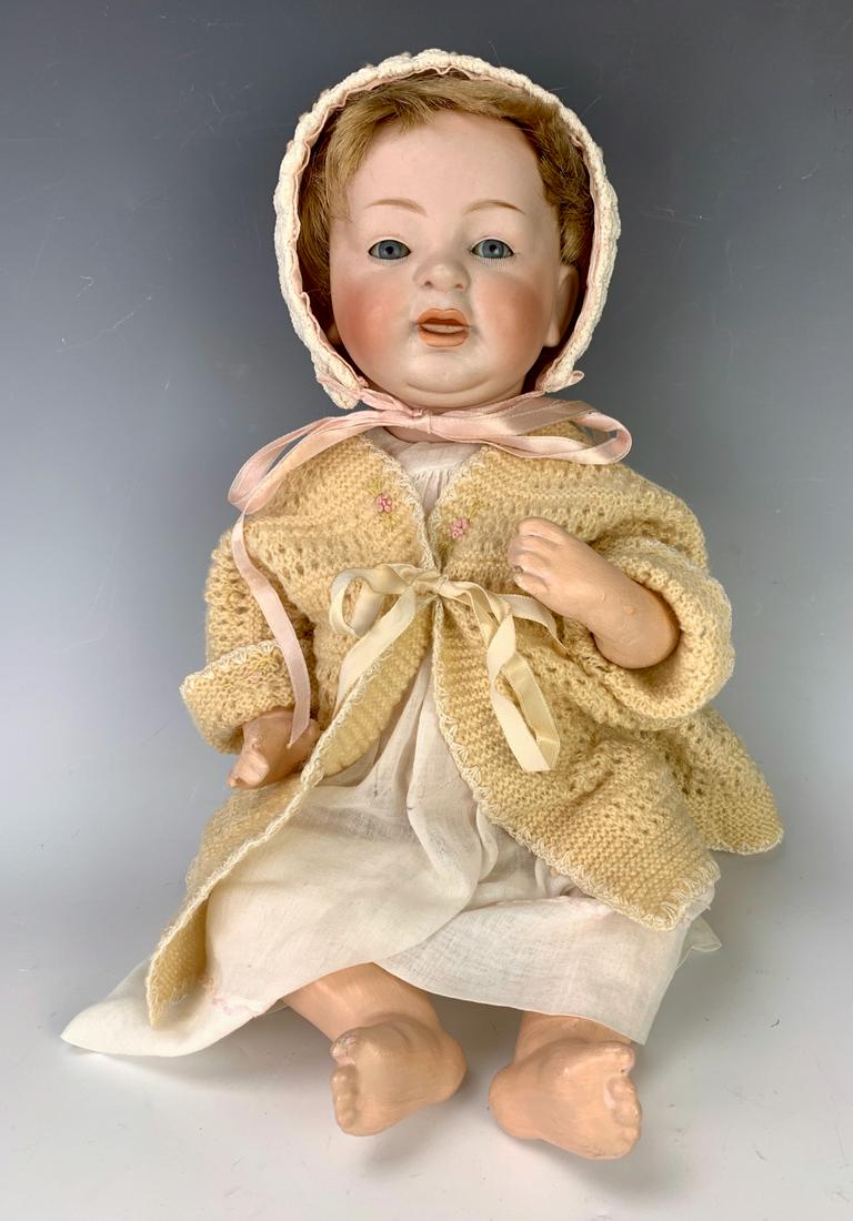 JD Kestner 211 "Sammy" Baby: Bisque head character baby, blue sleep eyes, open closed mouth, 5 piece composition baby body, repainted, no pate, very good condition, 16" height *Private collection of a Los Angeles collector.