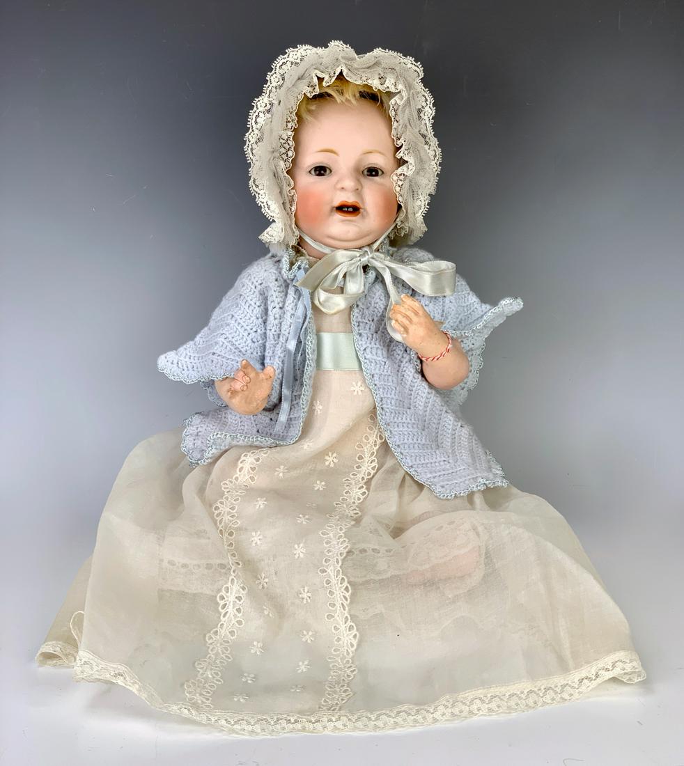 JD Kestner 211 "Sammy" Baby: Brown sleep eyes, open mouth, 5 piece composition baby body, right arm repainted, original plaster pate and wig, generally excellent condition, 16" height *Private collection of a Los Angeles collecto