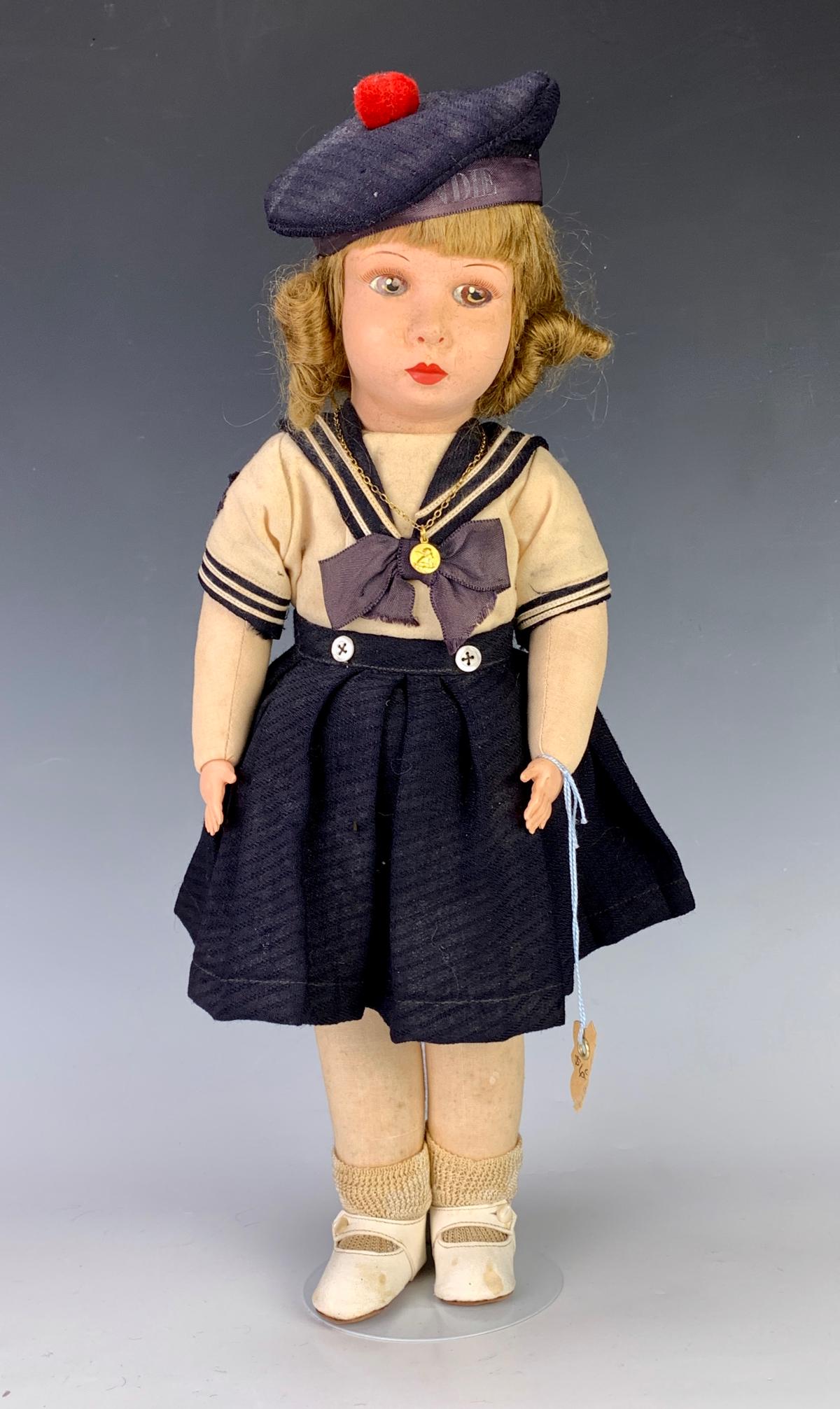 French Clelia Cloth Doll: Made in 1924, contemporary of Raynal, jointed cloth doll with painted celluloid head and celluloid hands, nicely tight strung, full hair under hat, all original,both shoes are stamped with "Clelia Fra