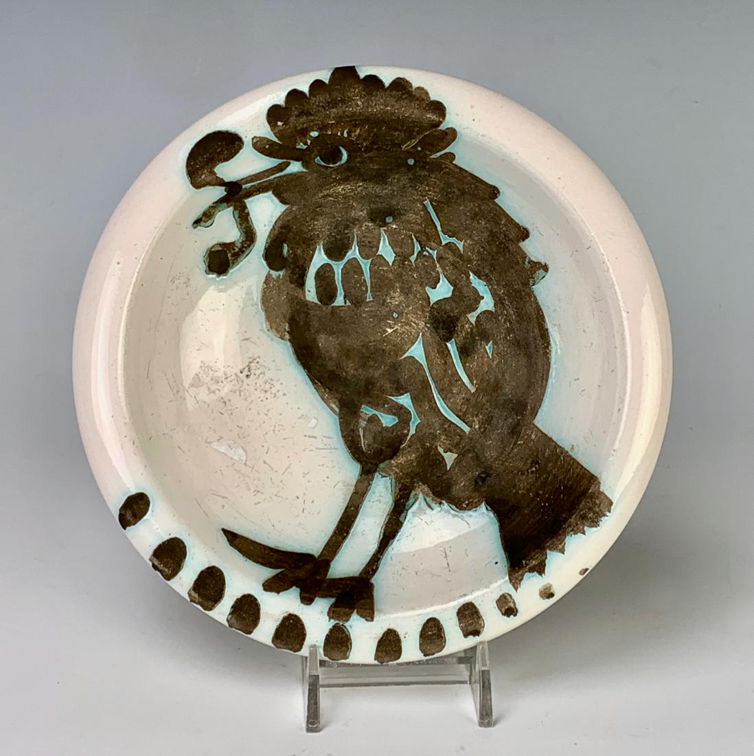 Pablo Picasso "Bird with Worm" Pottery Dish: Circa 1952, Pablo Picasso earthenware dish, painted in white, black and blue green, marked with Madoura stamp and Picasso edition, very good condition, 6.25" x 1.5"